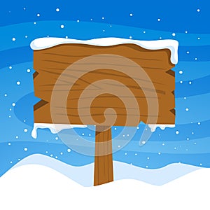 Christmas wood sign on winter background. Christmas wooden street signboad with snow.