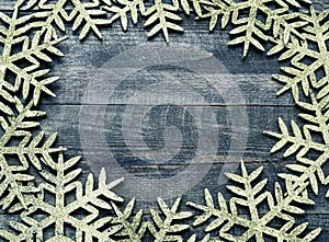 Christmas wooden background with decorative snowflakes. View with copy space.