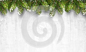 Christmas wooden background with fir branches