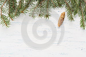 Christmas wooden background with fir branches