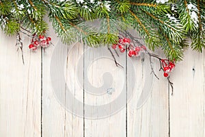 Christmas wooden background with fir tree
