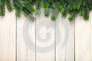 Christmas wooden background with fir tree