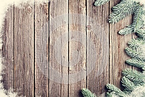 Christmas wooden background with fir tree