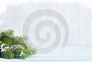 Christmas wooden background with fir tree