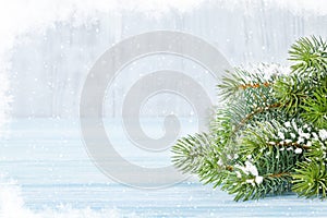 Christmas wooden background with fir tree