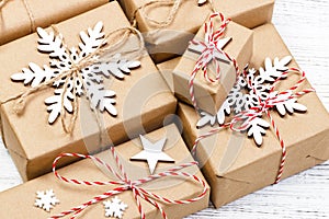 Christmas wooden background with gift boxes and decor. Top view with copy space for your text