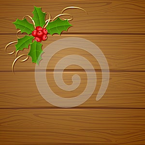 Christmas wooden background with holly berry