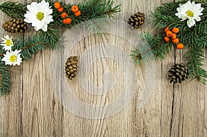 Christmas wooden background with natural decoration. Flat lay, top view