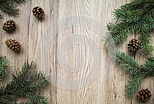 Christmas wooden background with natural decoration. Flat lay, top view