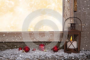 Christmas wooden background with an old rustic latern.
