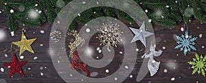 Christmas wooden background with snow fir tree.