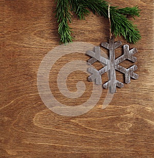 Christmas wooden background with snowflake