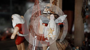 Christmas wooden colourise toys of angel hanging in the house