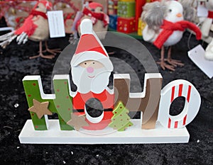 Christmas wooden HoHo santa claus gift decorated with stars and