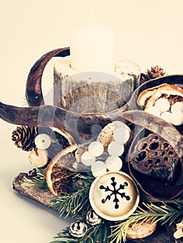 Christmas wooden stand with candles and decorations
