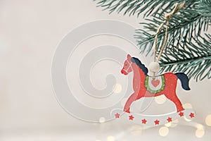 Christmas wooden toy in form red horse