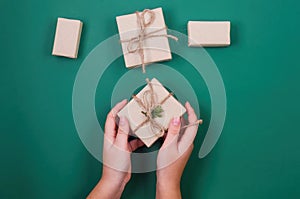 Christmas wrapping background with gift boxes in craft paper