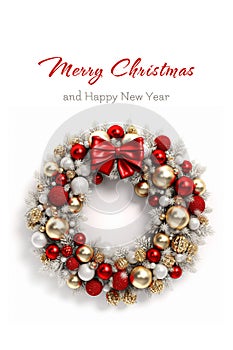 Christmas wreath with baubles and red bow photo