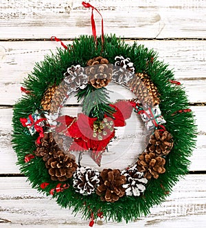 Christmas wreath decoration hangs on front door