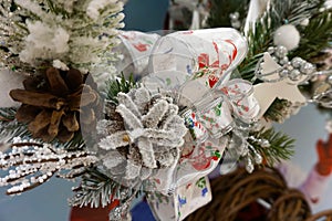 Christmas wreath from fir, pine and spruce twigs with cones, berries and ribbon bow as background - Image