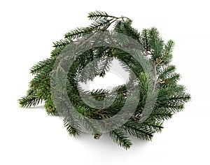 Christmas wreath from Green pine wreath isolated on a white background . It is the basis for making a beautiful