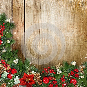 Christmas wreath on grunge wood texture with holly,firtree,vÃÂ­scum photo