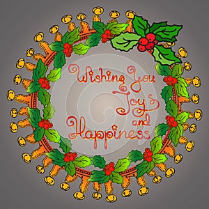 Christmas wreath, handwritten words Wishing You Joy and Happiness