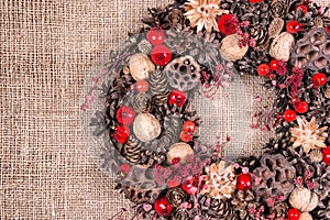 Christmas wreath on an old brown cloth