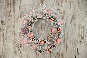 Christmas wreath with pink decor and bubbles