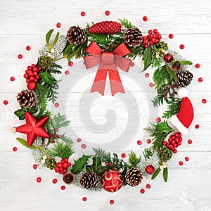 Christmas Wreath with Red Bow and Winter Flora