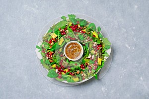 Christmas Wreath Salad with Pomegranate, Avocado, Salad Mix, Almond and Honey-Mustard Dressing, Healthy Eating