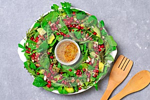 Christmas Wreath Salad with Pomegranate, Avocado, Salad Mix, Almond and Honey-Mustard Dressing, Healthy Eating