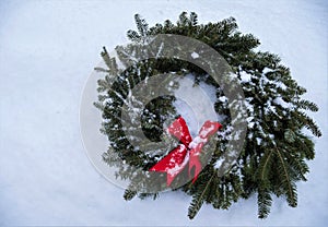 Christmas Wreath on a snowy background