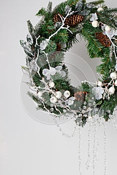Christmas wreath of spruce with cones