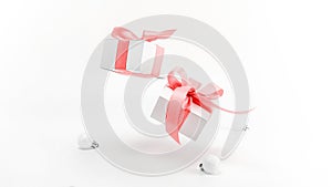Christmas wreath. White gift box with red ribbon, New Year balls in xmas composition on white background for greeting card.