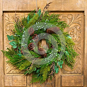 Christmas Wreath on Wooden Door