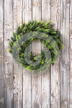 Christmas wreath on wooden door