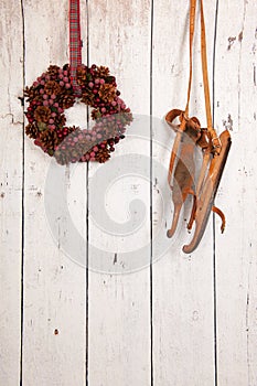 Christmas wreath on wooden wall