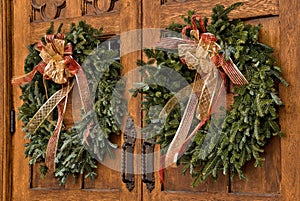 Christmas wreaths on wooden doors