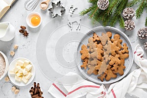 Christmas or X-mas baking culinary background, cooking recipe. Xmas, Noel gingerbread cookies on kitchen table and ingredients