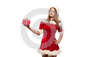 Christmas, x-mas, winter, happiness concept - smiling woman in santa helper hat with gift box, isolated on White