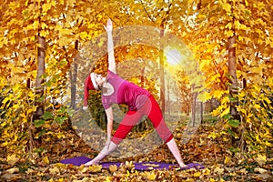 Christmas Yoga trikonasana pose