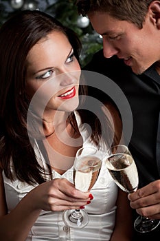 Christmas:Young couple with champagne