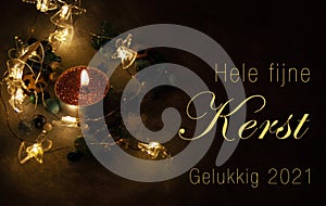 Christmascard in Dutch with candle and lights