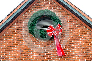 ChristmasWreath on a Brick Wall photo