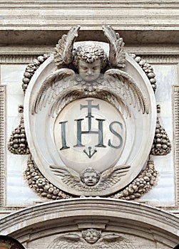 Christogram IHS, facade of the Church of the Gesu, mother church of the Society of Jesus, Rome photo