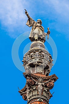 Christopher Columbus statue pointing beyond photo