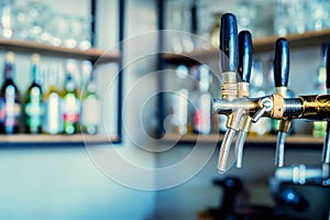 Chrome beer taps in modern bar