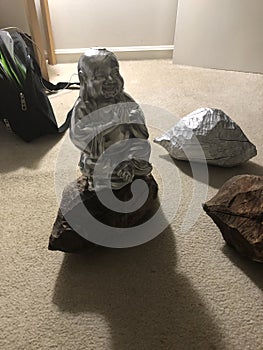 Chrome Buddha on beaverwood