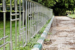 Chrome fence unswept path Gardens Bangalore